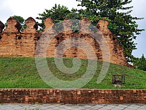 old cityÃ¢â¬â¹ wallÃ¢â¬â¹ withÃ¢â¬â¹ grassÃ¢â¬â¹ andÃ¢â¬â¹ akyÃ¢â¬â¹ photo